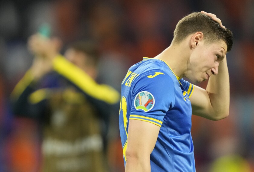 Ukraine's Mykola Matviyenko reacts at the end of the Euro 2020 soccer championship group C match between the Netherlands and Ukraine at the Johan Cruijff Arena in Amsterdam, Netherlands, Sunday, June 13, 2021. (AP Photo/Peter Dejong, Pool)