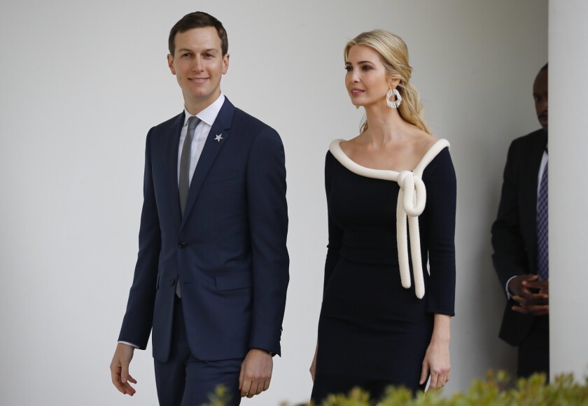 White House senior advisers Jared Kushner and Ivanka Trump walk back to the White House after attending the State Arrival Ceremony on the South Lawn of the White House on April 24.