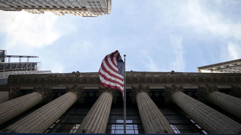 A flag flies from the New York Stock Exchange.