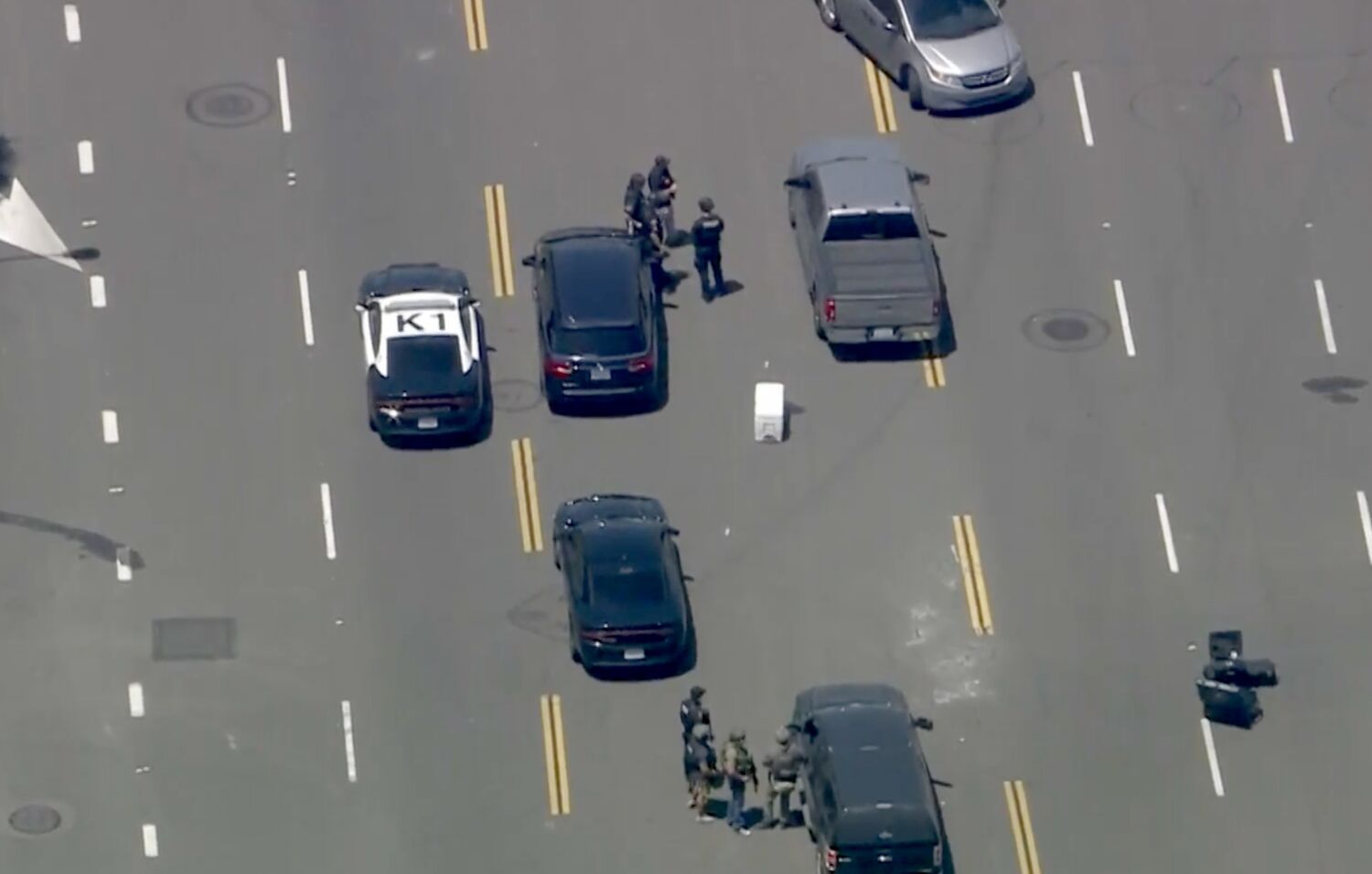 Police search for armed bank robbery suspects in Anaheim