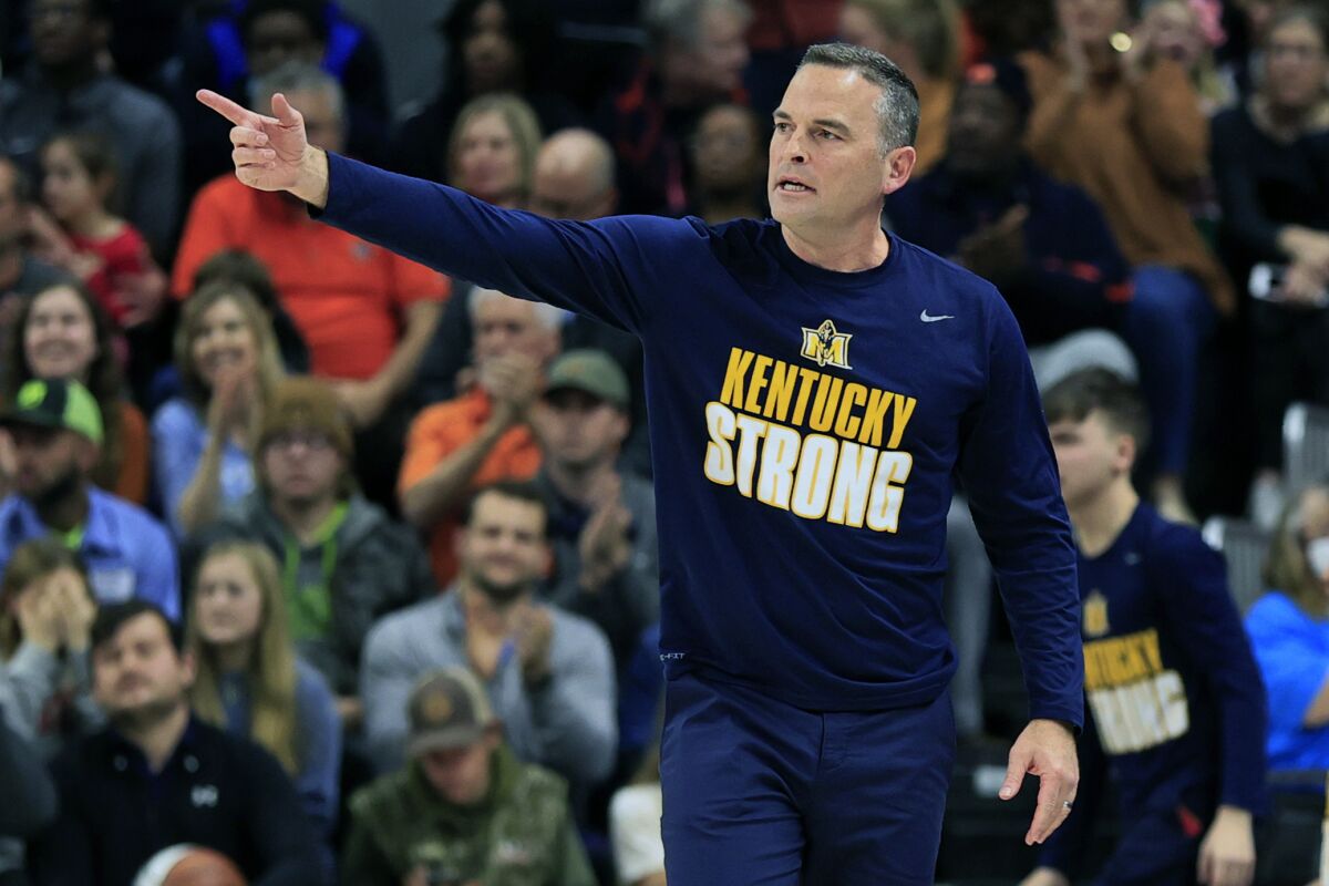 FILE - Murray State head coach Matt McMahon reacts to a call during the first half of an NCAA college basketball game against Auburn Wednesday, Dec. 22, 2021, in Auburn, Ala. No. 23 Murray State will play two games this week with its first AP Top 25 ranking since 2015. (AP Photo/Butch Dill, File)