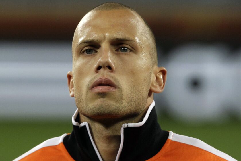 Netherlands' John Heitinga during the World Cup semifinal soccer match between Uruguay and the Netherlands at the Green Point stadium in Cape Town, South Africa, on, July 6, 2010. Ajax appointed former Netherlands international John Heitinga as its head coach until the end of the season, replacing Alfred Schreuder, who was fired last week after a run of seven victories. (AP Photo/Frank Augstein)