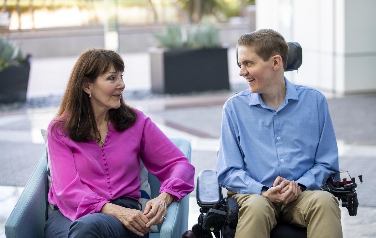 Debra Miller and her son, Hawken, talk about his diagnosis at age 5 of Duchenne Muscular Dystrophy on Tuesday.