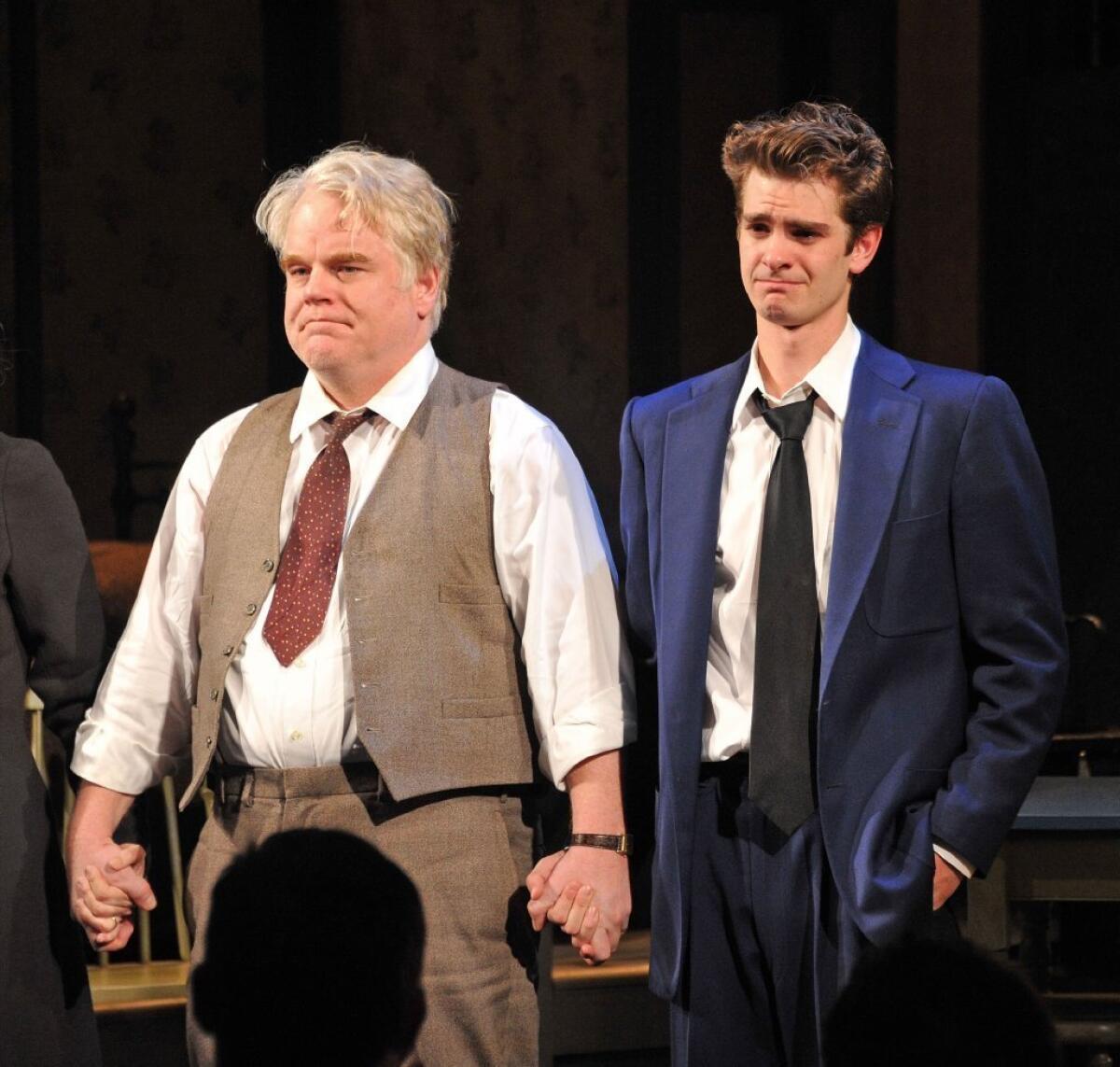 Philip Seymour Hoffman at a curtain call for "Death of a Salesman" on Broadway, with costar Andrew Garfield.