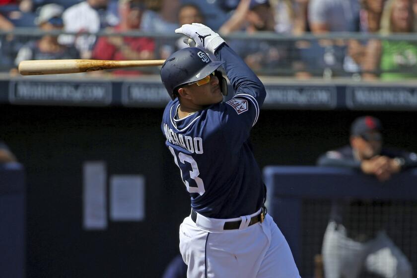 Machado gets first hits as Padre, Kinsler goes yard in win