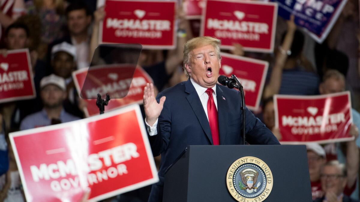 President Trump speaks at a campaign rally for South Carolina Gov. Henry McMaster in West Columbia, S.C.