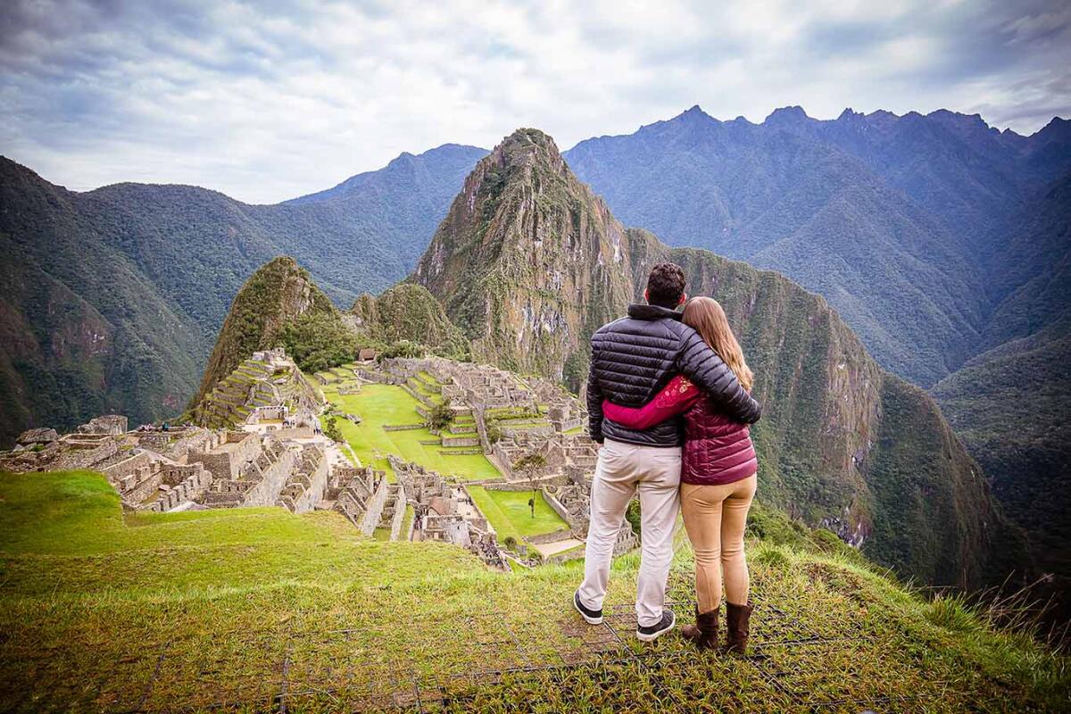 Picture of couple admiring Machu Picchu