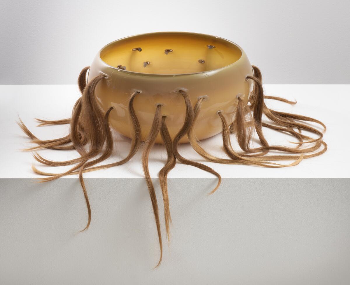 A hand-blown glass and hair sculpture featured in "Kelly Akashi: Formations."  