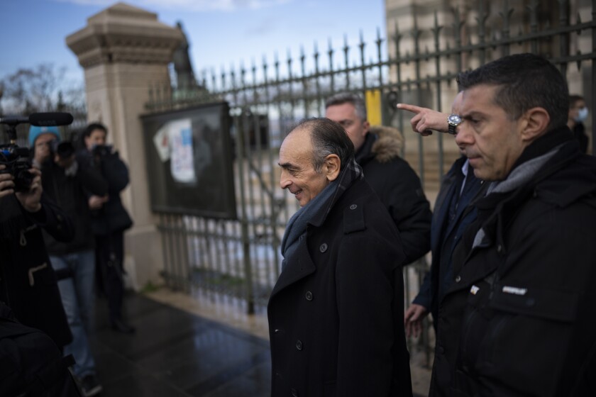 Hard-right political talk-show star Eric Zemmour leaves the Major Cathedral in Marseille, southern France, Saturday, Nov. 27, 2021. The first French presidential ballot will take place next year on April 10 and the two top candidates go into a runoff on April 24. (AP Photo/Daniel Cole)