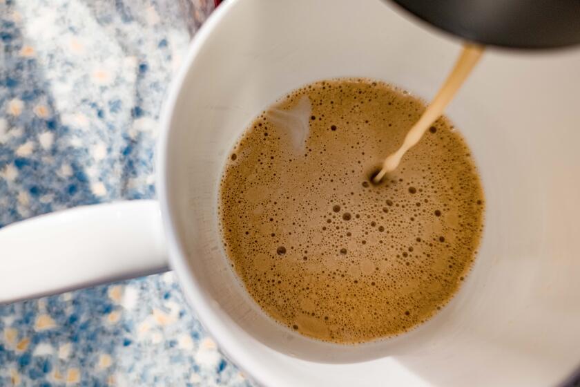 15 April 2024, Hamburg: Coffee runs out of a coffee machine into a cup. Photo: Markus Scholz/dpa (Photo by Markus Scholz/picture alliance via Getty Images)