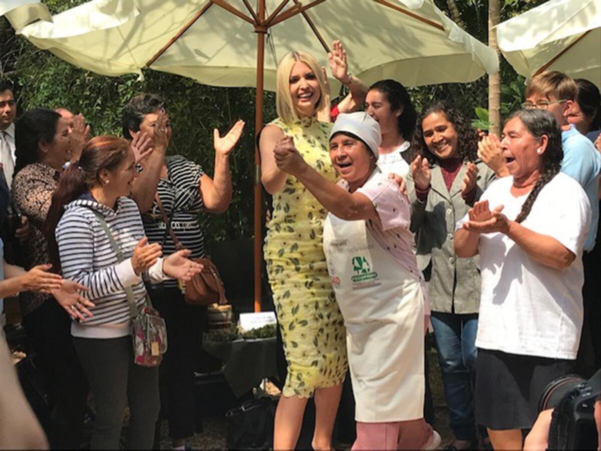 Ivanka Trump dances with a market vendor in Asuncion, Paraguay, earlier this month during a three-nation tour through South America promoting women's empowerment.