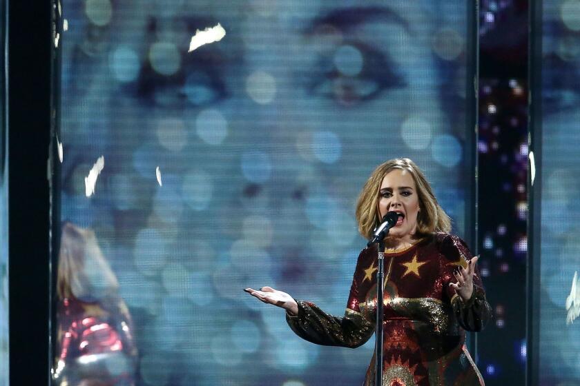 Adele performs during the Brit Awards in London on February 24, 2016.