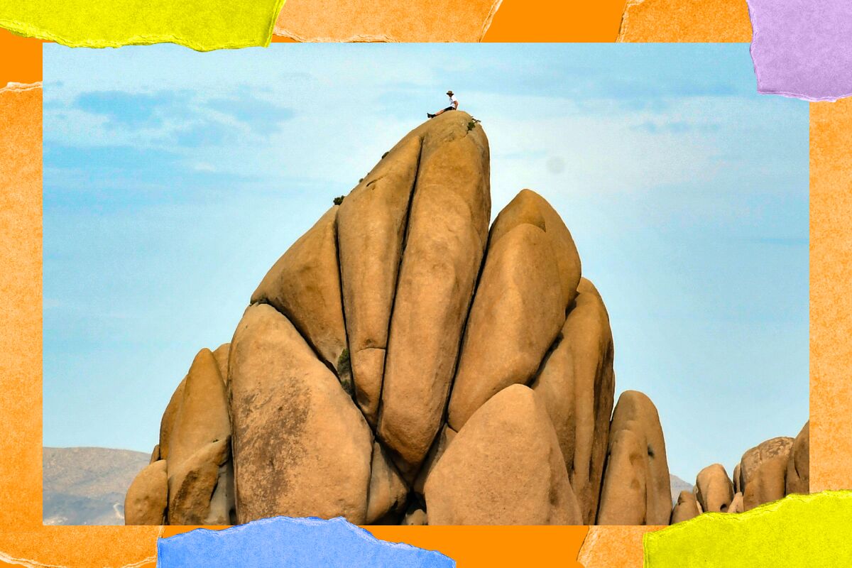 A climber rests in the Jumbo Rocks area of Joshua Tree National Park in March 2019.
