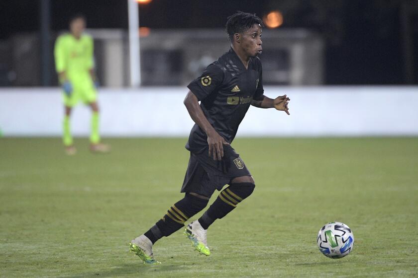 Los Angeles FC forward Latif Blessing controls a ball during the second half of an MLS soccer match against the Portland Timbers, Thursday, July 23, 2020, in Kissimmee, Fla. (AP Photo/Phelan M. Ebenhack)