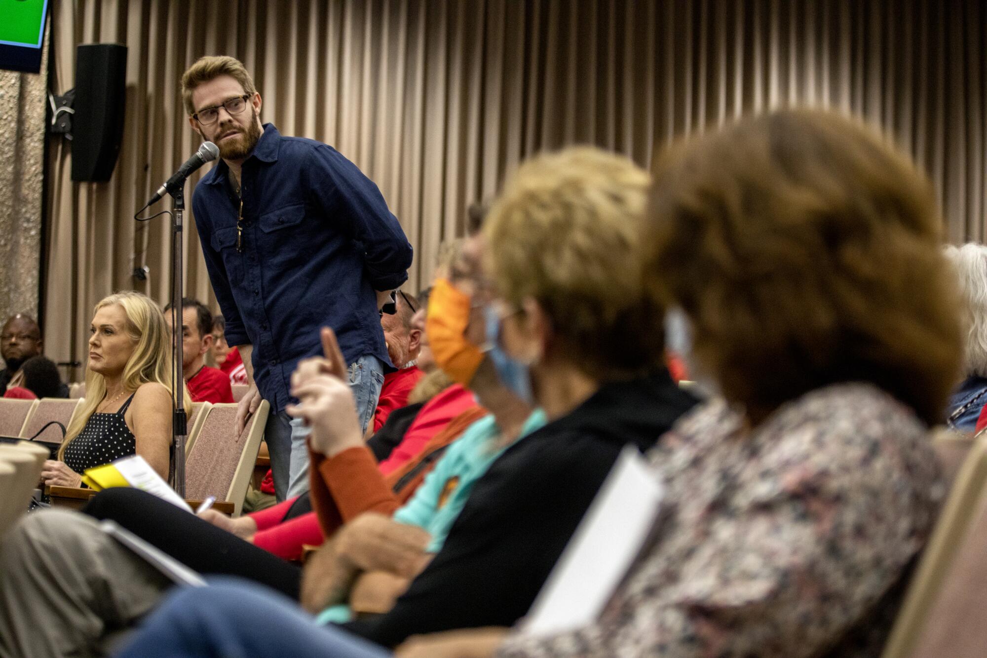 Jack Brandhorst, owner of the gun shop Red Rifle in Carson, speaks during a Torrance planning commission meeting.