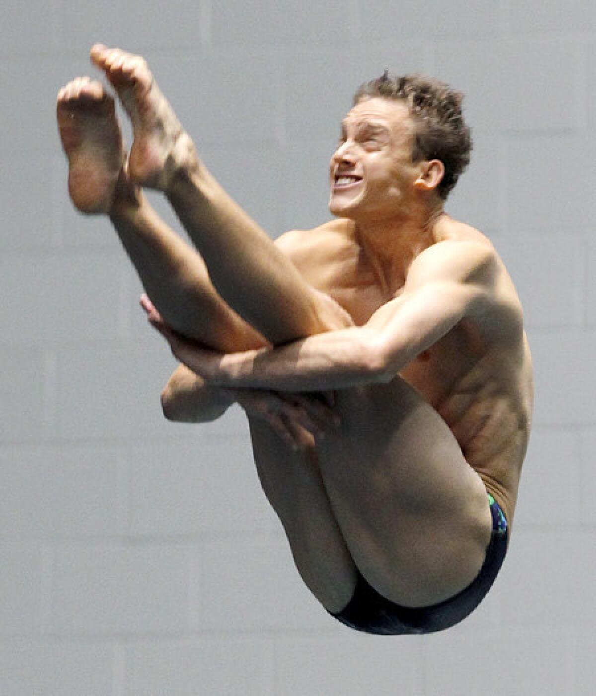 Chris Colwill performs a dive during the U.S. Olympic trials last year.