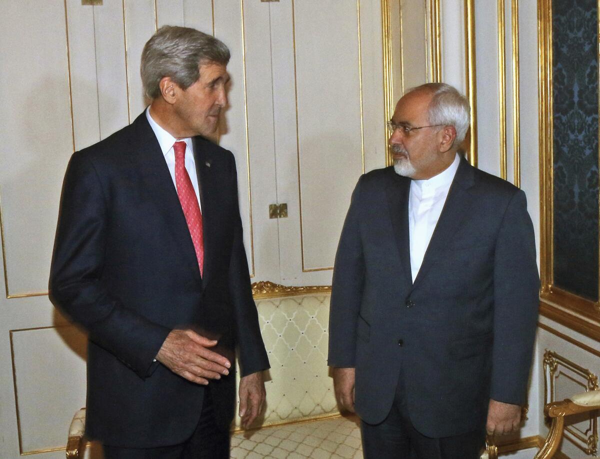 Secretary of State John Kerry talks with Iranian Foreign Minister Mohammad Javad Zarif in Vienna in November 2014.