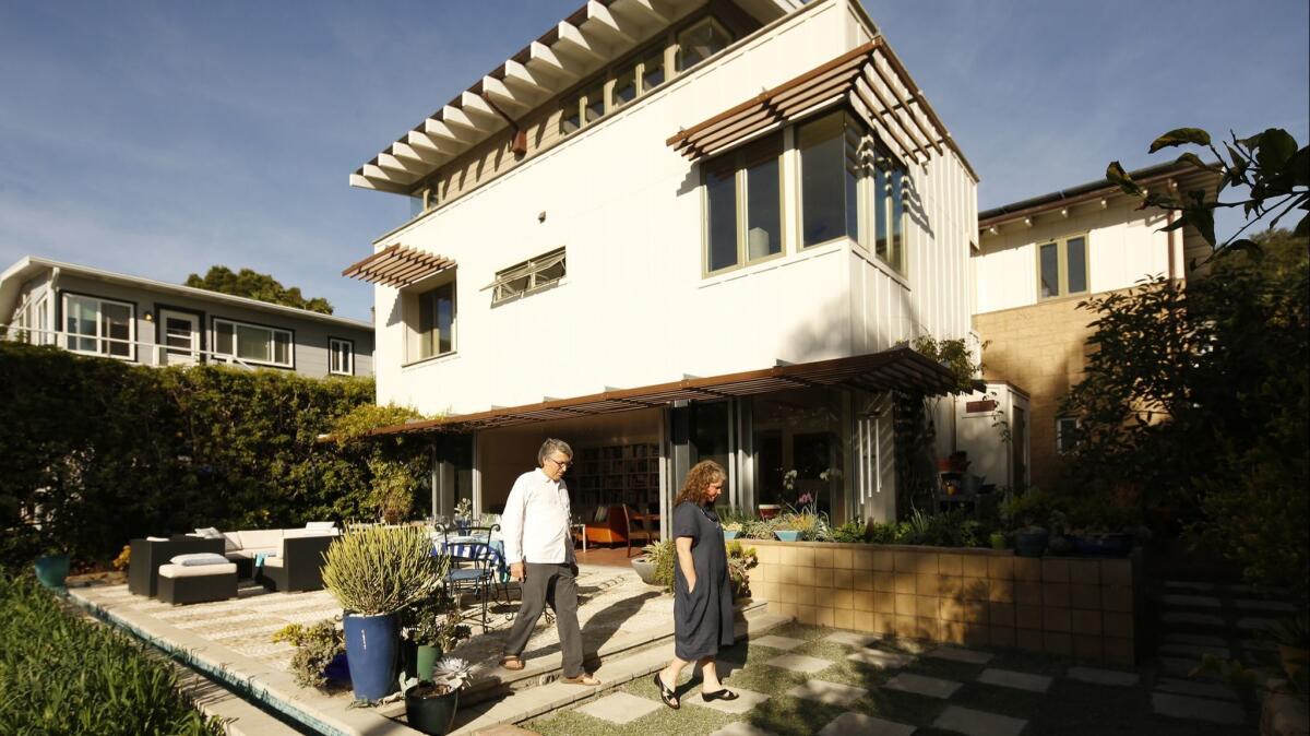 Architect Kevin Dumain designed a three-story house that goes up, not out, in an effort to create garden space and privacy.