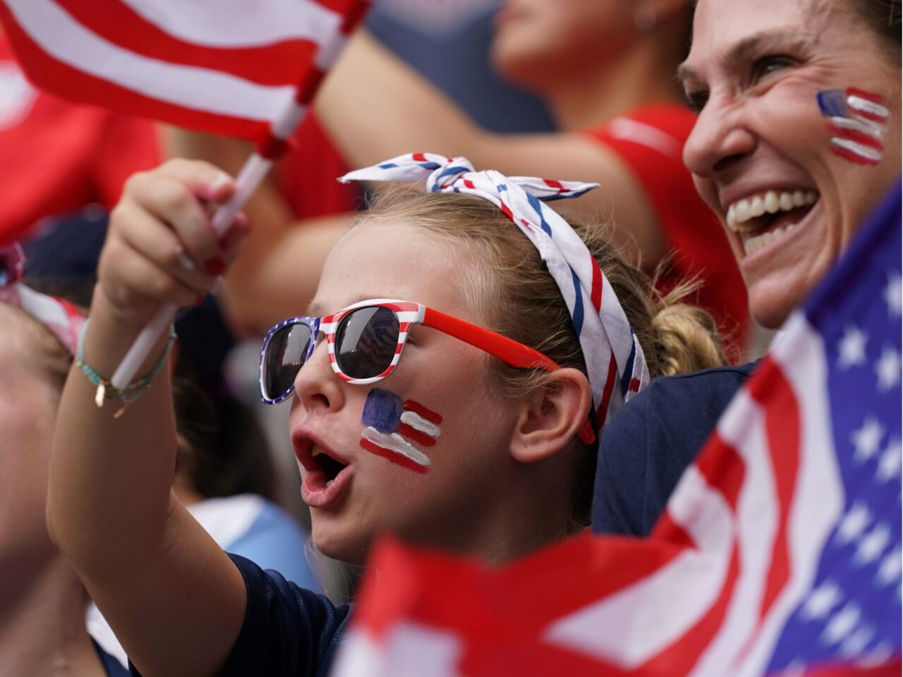 US supporters cheer their team during the France 2019 Women's World Cup round of sixteen between Spain and USA in Reims, France.