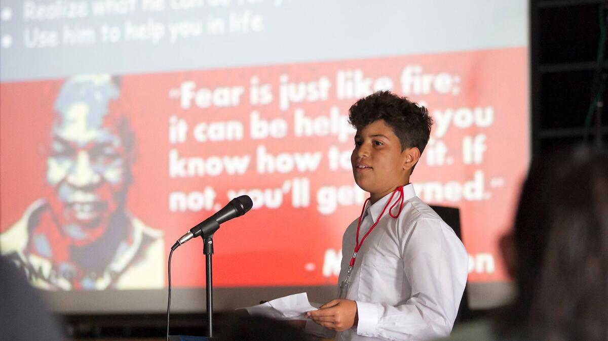 Noah Genus gives a short speech about Mike Tyson's life as he participates in the TED Talk at Sonora Elementary School.