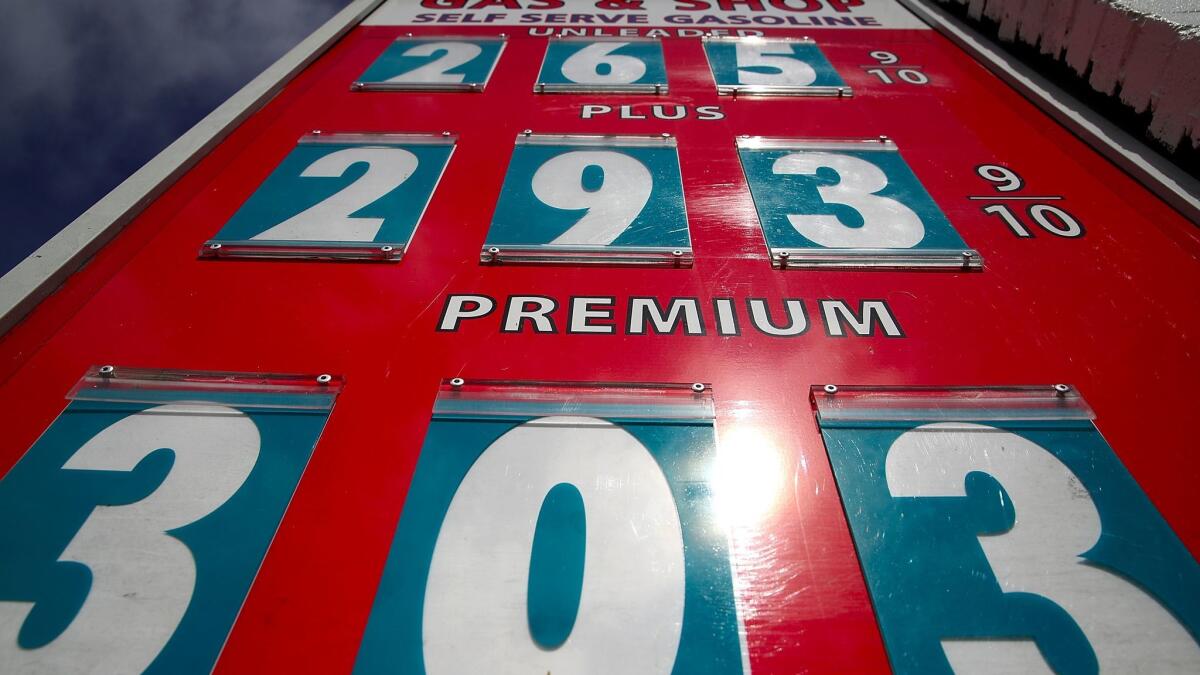 Prices are displayed at a San Anselmo gas station on May 10. The state's gas taxes will go up this year, and a ballot initiative has been filed for voters to consider scrapping the plan in 2018.