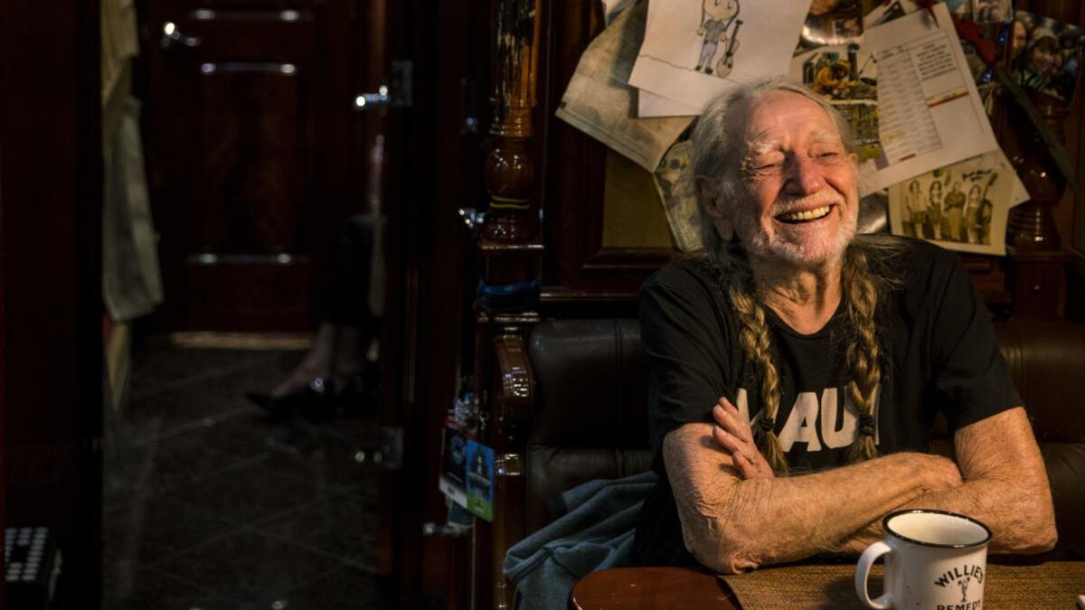 Texas singer-songwriter Willie Nelson, on his tour bus in Hollywood before a taping of "Jimmy Kimmel Live!," has a released a new song titled "Vote 'Em Out" ahead of the November midterm elections.