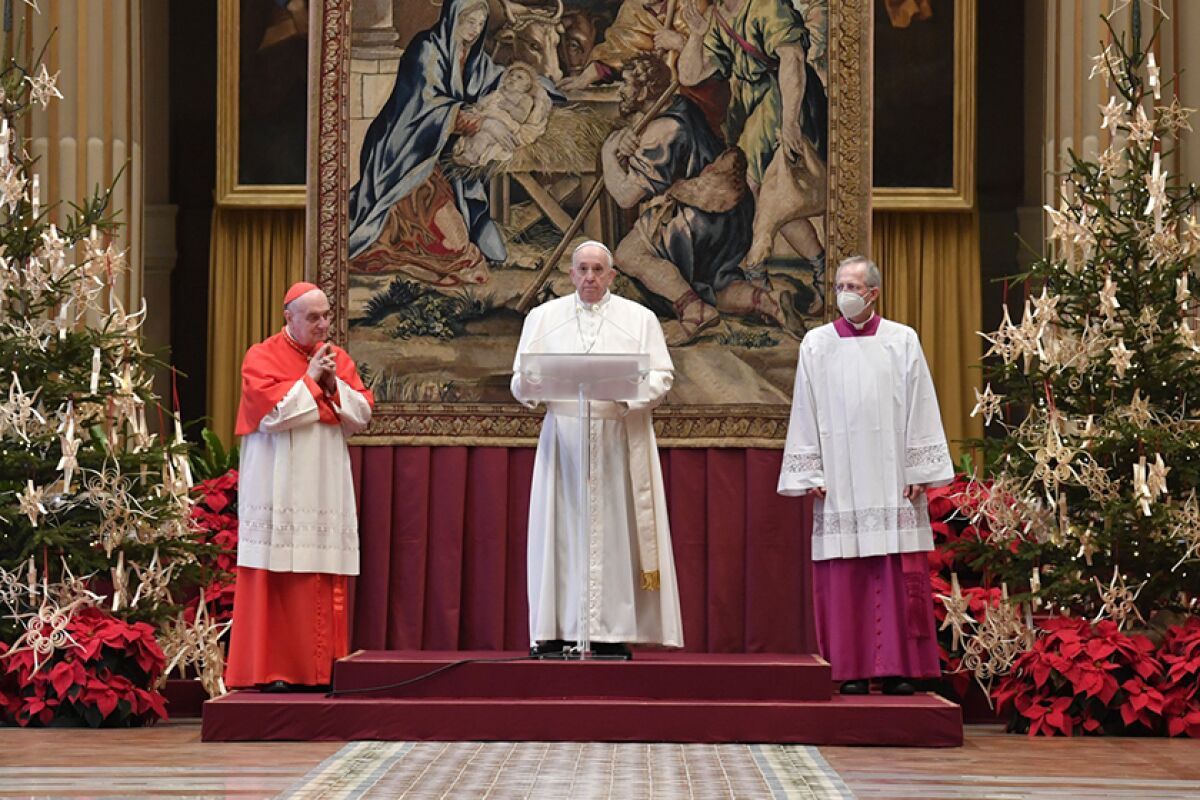 Pope Francis delivers a Christmas Day speech from inside the Apostolic Palace in Vatican City.