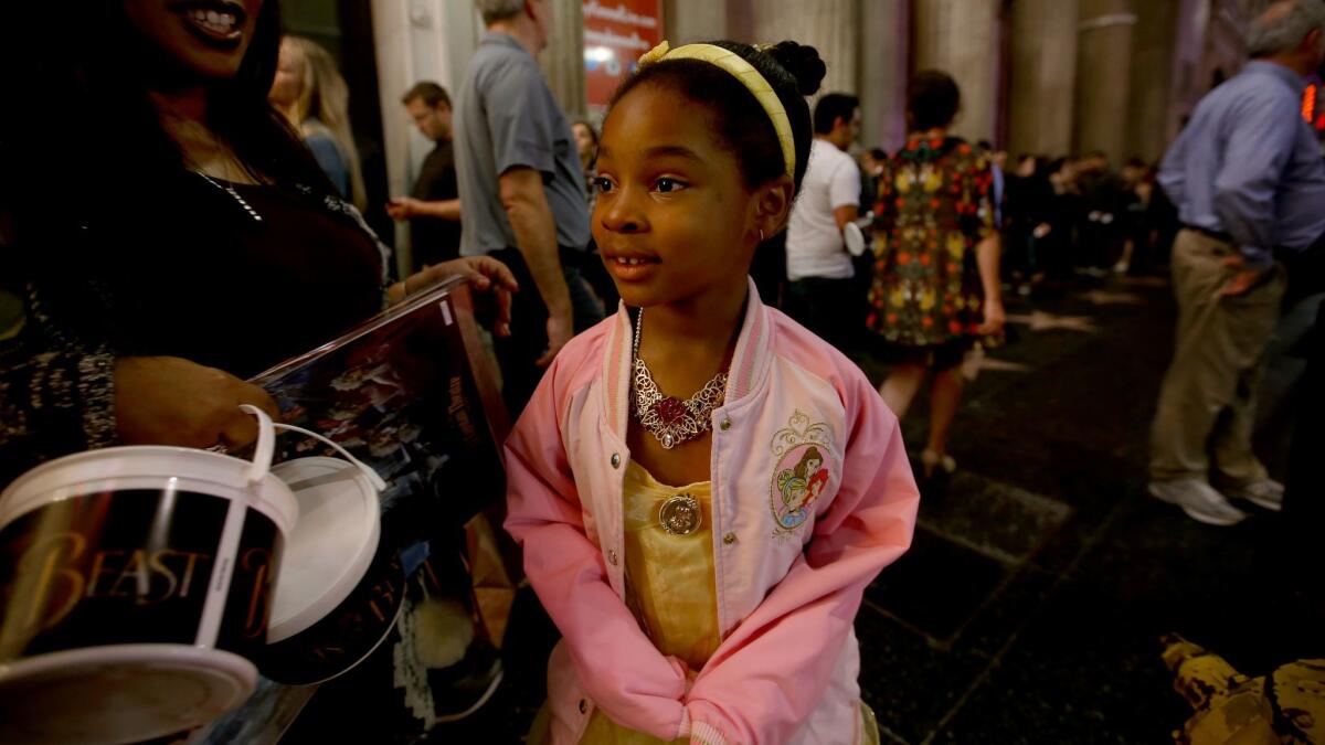 Skylar Gordon, 7, of Los Angeles is all smiles as she exits "Beauty and the Beast" at Hollywood's El Capitan Theatre.