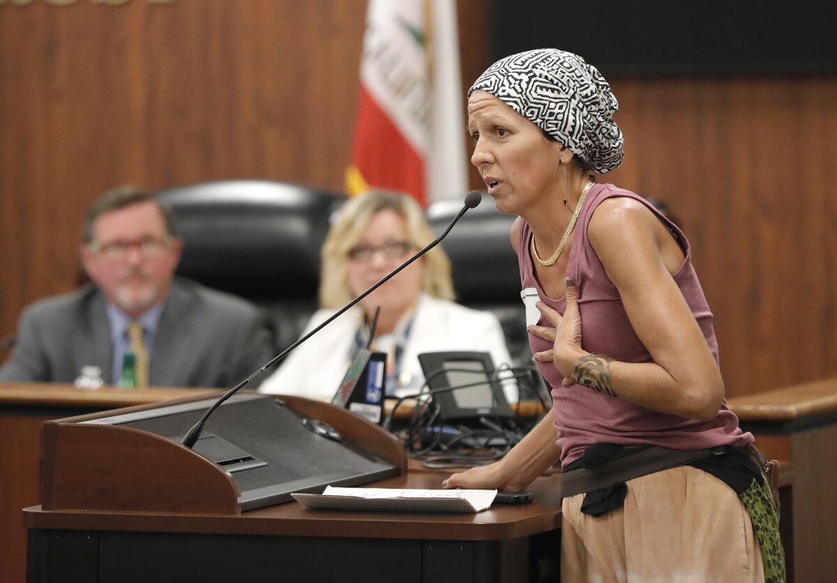 Public speaker Linda Rowlson makes emotional comments Tuesday during an O.C. Board of Education ethnic studies forum.