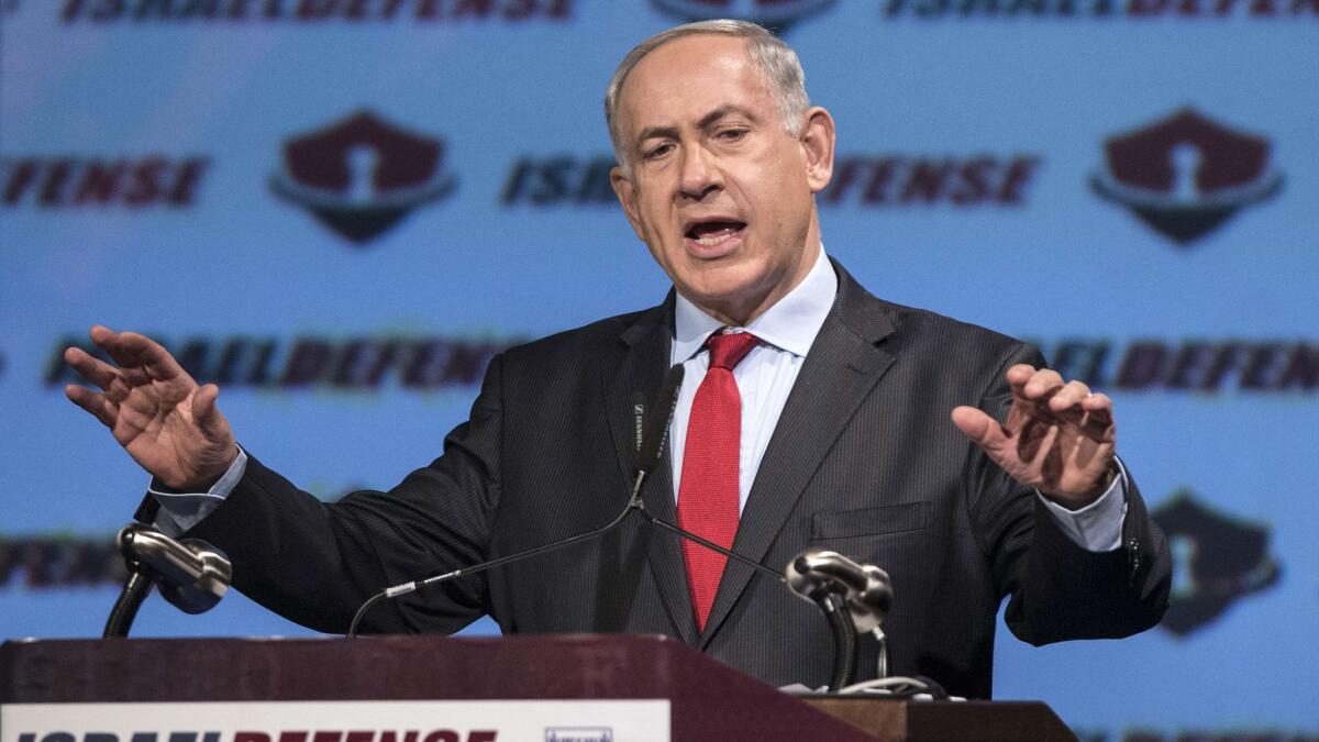 Israeli Prime Minister Benjamin Netanyahu gives the opening speech of the CyberTech 2014 international conference in Tel Aviv.
