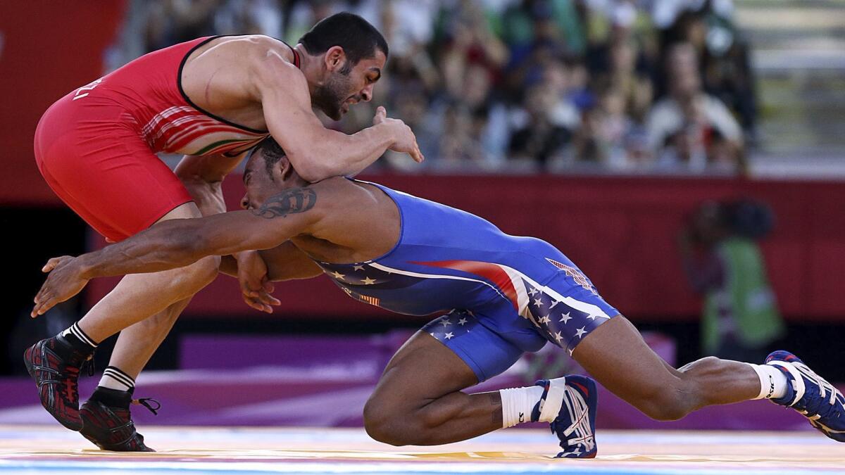 U.S. wrestler Jordan Burroughs competes against Iran's Sadegh Saeed in the men's 74-kilogram freestyle wrestling gold medal match at the 2012 Olympics in London.