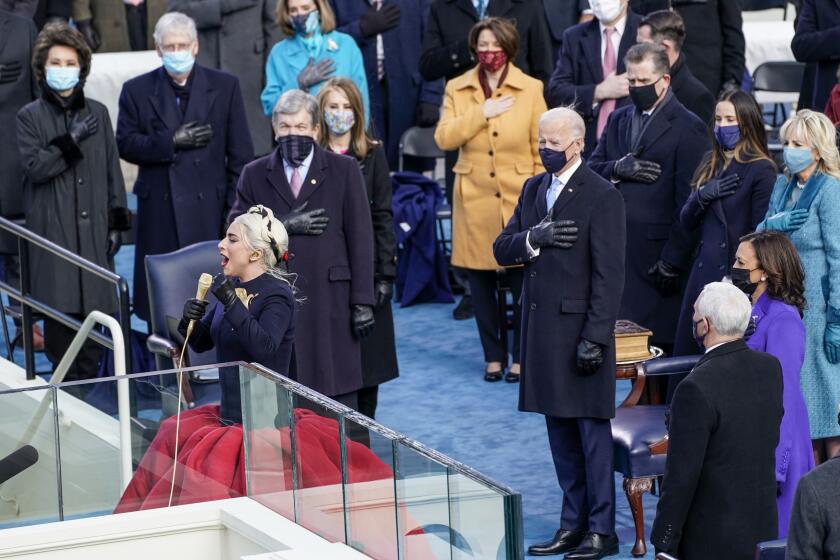 Washington , DC - January 20: Singer Lady Gaga performs the National Anthem during the 59th presidential inauguration in Washington, D.C. on Wednesday, Jan. 20, 2021. (Kent Nishimura / Los Angeles Times)