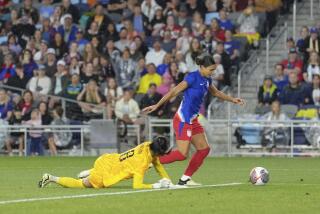 United States forward Sophia Smith, right, works past South Korea goalkeeper Kim Jung-mi to score during the second half of an international friendly soccer match in St. Paul, Minn., Tuesday, June 4, 2024. (AP Photo/Abbie Parr)