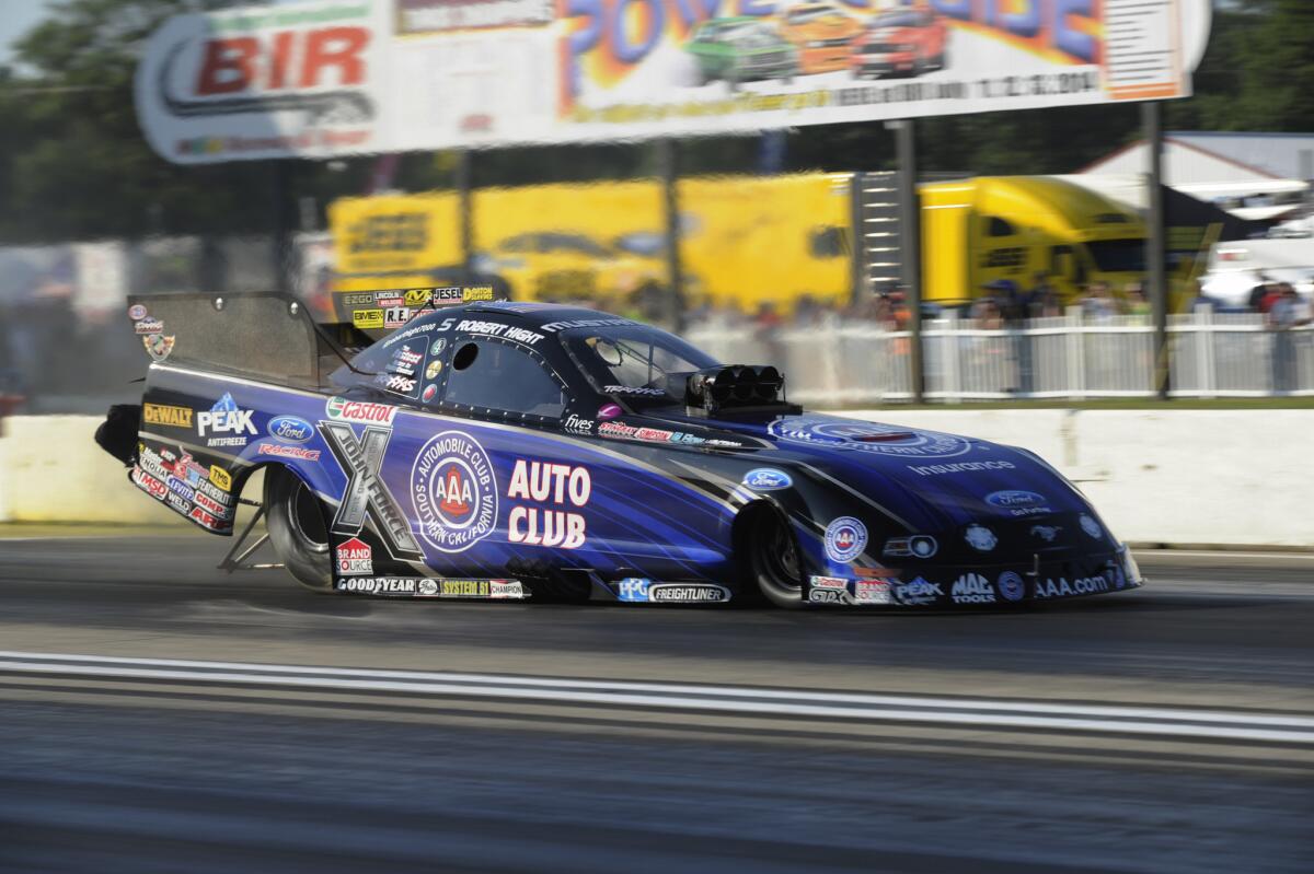 Robert Hight drives during funny-car qualifying for the Lucas Oil NHRA Nationals drag races on Aug. 15.