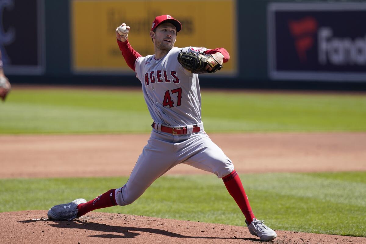 Los Angeles Angels starting pitcher Griffin Canning delivers to a Kansas City Royals batter.