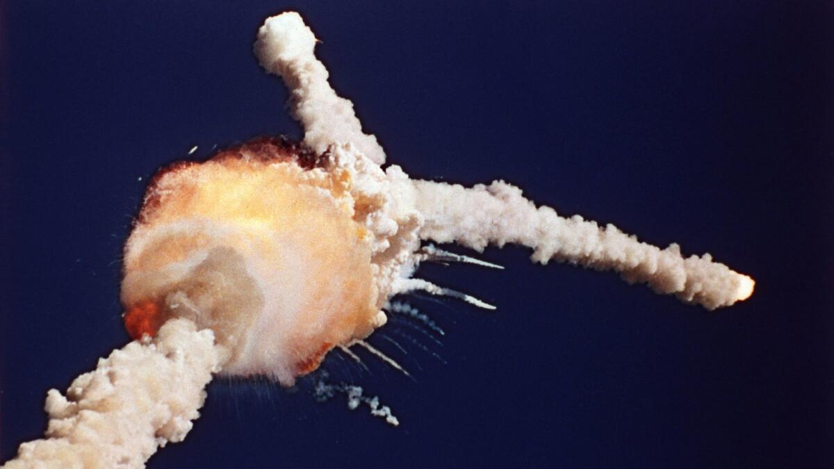 FILE - In this Jan. 28, 1986 file photo, the space shuttle Challenger explodes shortly after lifting off from the Kennedy Space Center in Cape Canaveral, Fla. (AP Photo/Bruce Weaver, File) ORG XMIT: NY593
