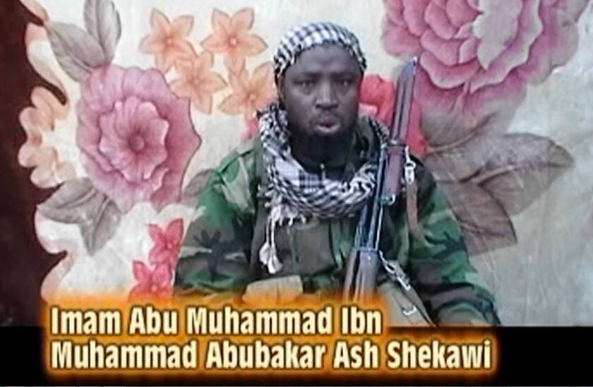 The leader of the Islamist militant group Boko Haram issues a warning in a video image. Boko Haram fighters clashed with Nigeria's military just days after President Goodluck Jonathan offered an amnesty to the group.