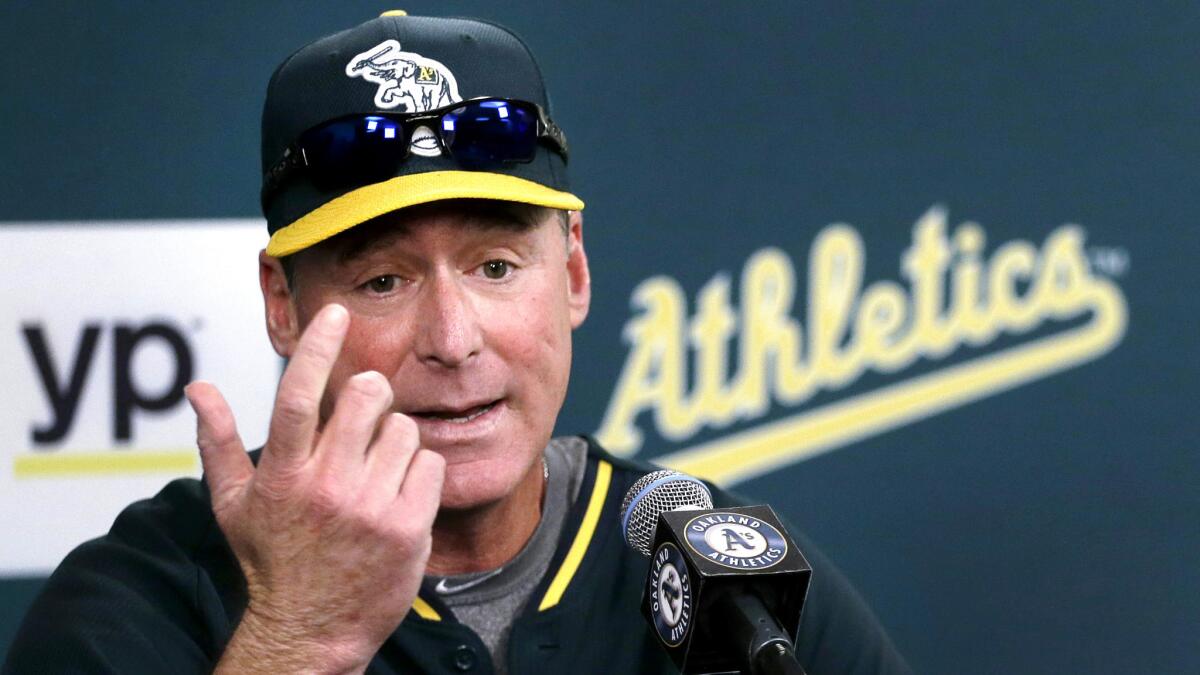 A's Manager Bob Melvin fields a question during a news conference Wednesday to announce his contract has been extended by two seasons through 2018.