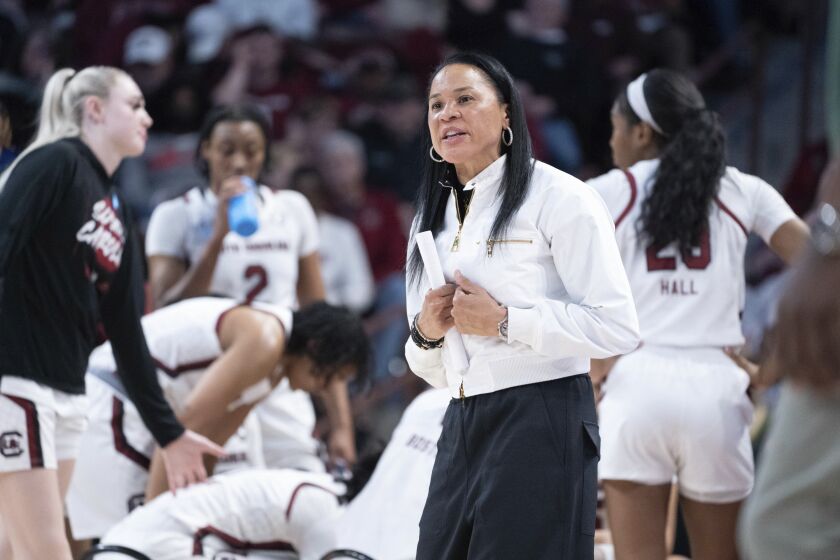 South Carolina head coach Dawn Staley communicates with an official in the second half of a first-round college basketball game against Norfolk State in the NCAA Tournament, Friday, March 17, 2023, in Columbia, S.C. (AP Photo/Sean Rayford)