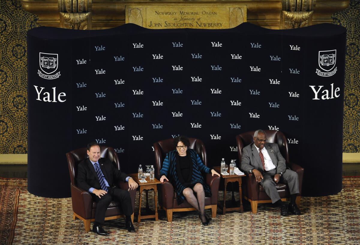 U.S. Supreme Court justices Samuel Alito, Jr., left, Sonia Sotomayor and Clarence Thomas at a conversation at Yale University, where all three attended.