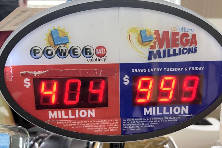 The Mega Millions jackpot has grown to more than $1 billion dollars, with a ticket shown from 168 Market in Hacienda Heights on Friday, Jan. 13, 2023.