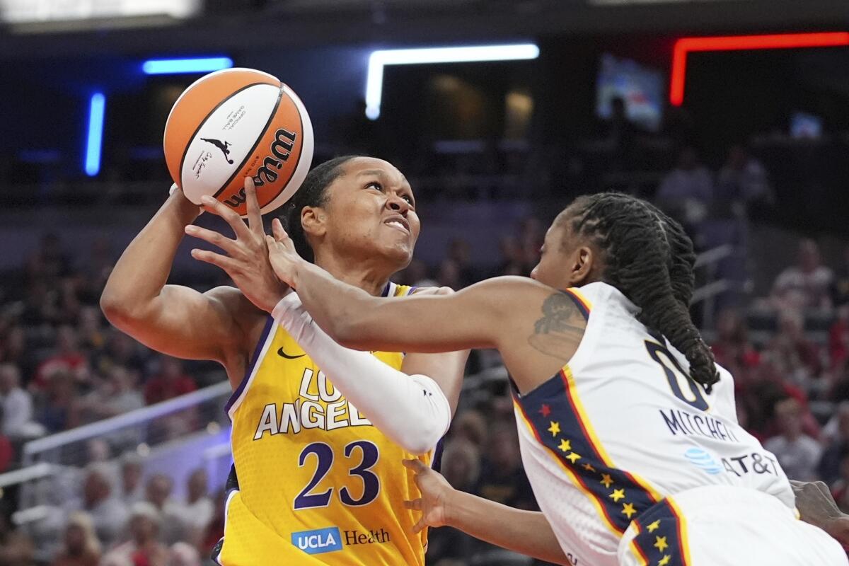 Sparks guard Azura Stevens shoots in front of Indiana guard Kelsey Mitchell.