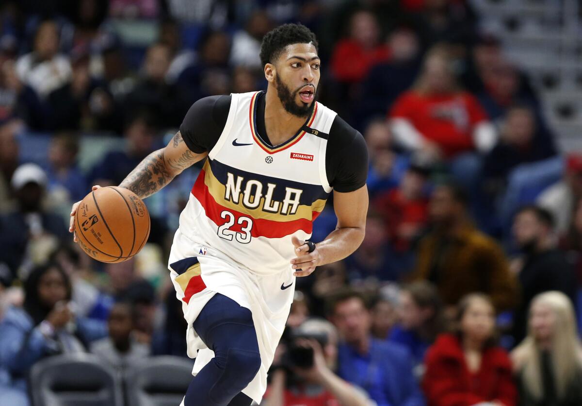 Anthony Davis brings the ball up during the first half of the game between the New Orleans Pelicans and Phoenix Suns in New Orleans on March 16.