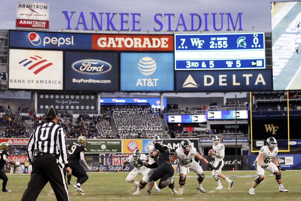 Michigan State quarterback Brian Lewerke looks to pass against the Wake Forest in the Pinstripe Bowl.