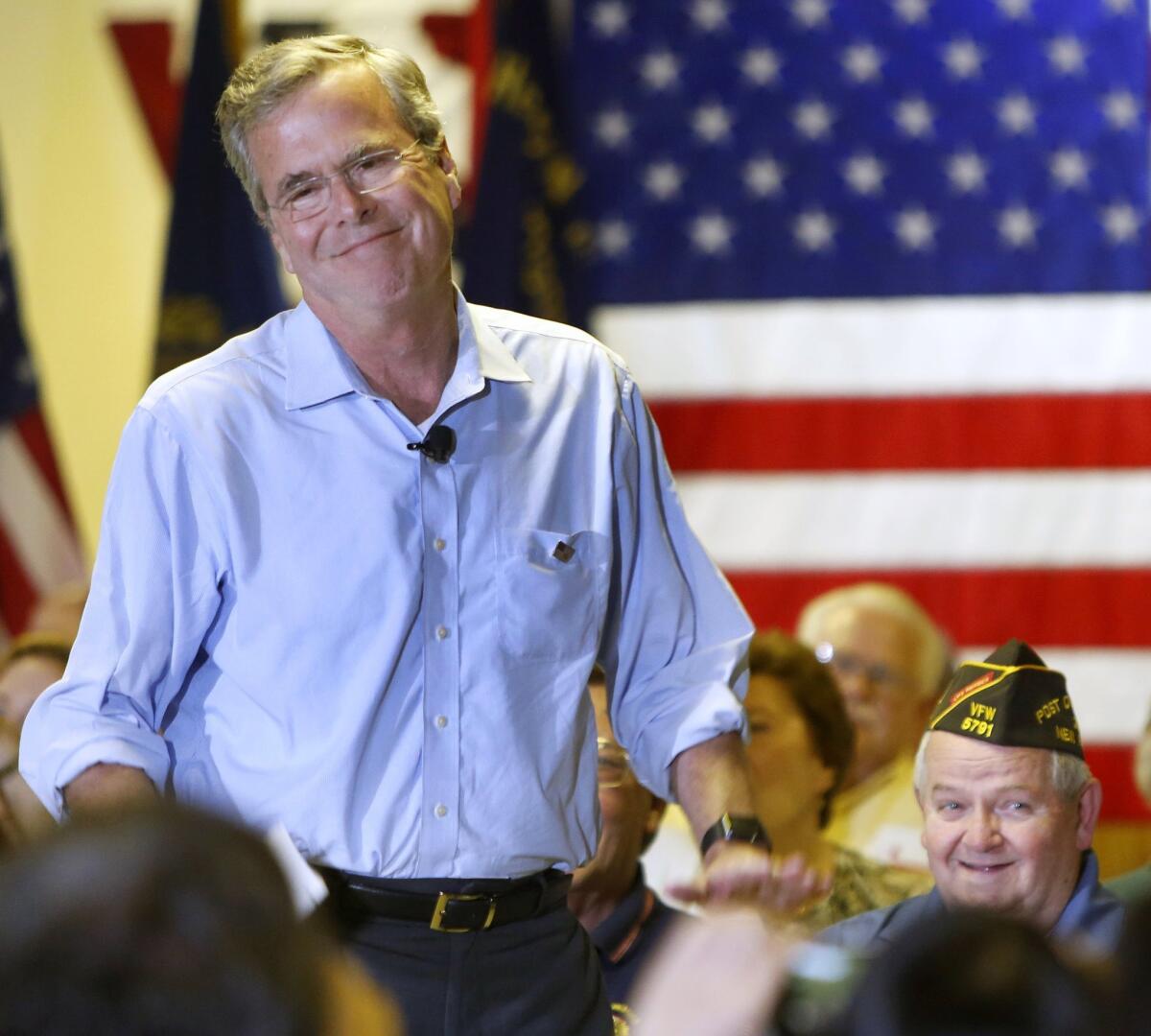 Republican presidential candidate Jeb Bush speaks at a town hall meeting on July 8, in Hudson, N.H. Bush raised $11.4 million in 16 days after formally launching his campaign for president, his campaign said Thursday.
