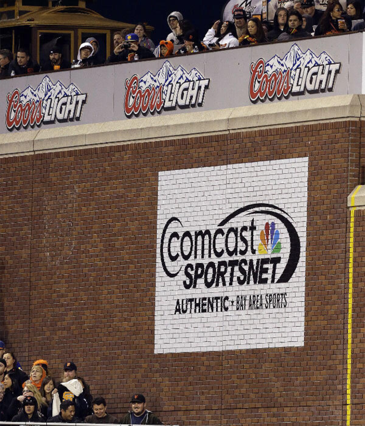 Glue is seen on the brick facade in right center field at AT&T; Park, to the left of the Comcast sign, where a now-missing plaque commemorating Barry Bonds' 756th home run was affixed.