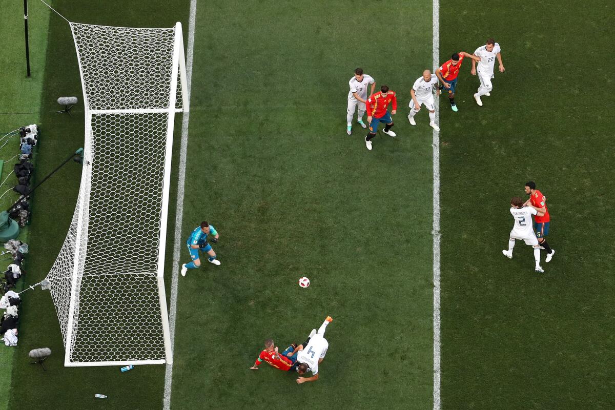 Sergey Ignashevich of Russia scores an own goal to put Spain in front 1-0 during the 2018 FIFA World Cup Russia Round of 16 match between Spain and Russia at Luzhniki Stadium on July 1, 2018 in Moscow, Russia.
