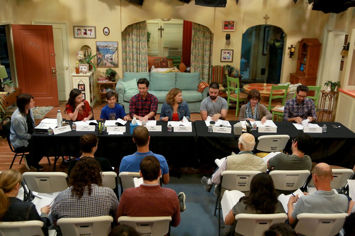 A table read of Netflix's Latino update of "One Day at a Time includes, from left: director Pam Fryman, Isabella Gomez, Marciel Ruiz, Jay Hayden, Justina Machado, James Martinez, Rita Moreno and Todd Grinnell.