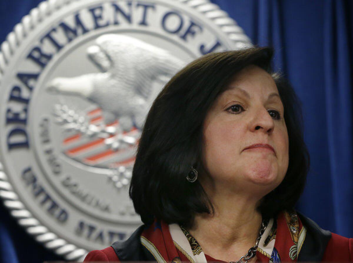 U.S. Attorney Carmen Ortiz during a news conference in Boston on Thursday. Ortiz, who has been sharply criticized following Swartz's suicide, appeared to fight back tears as she defended her office's handling of the hacking case against him.