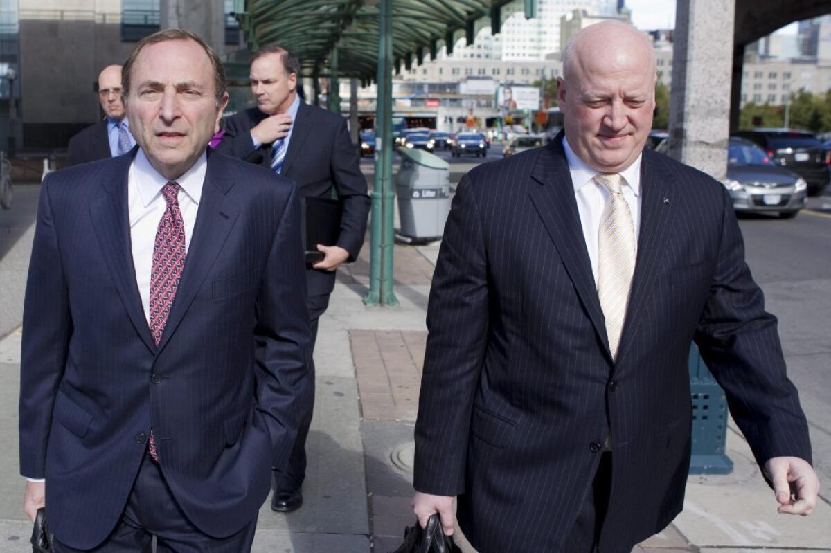 NHL Commissioner Gary Bettman, left, arrives with deputy commissioner Bill Daly as the NHL and its locked-out players held negotiations in Toronto last week.